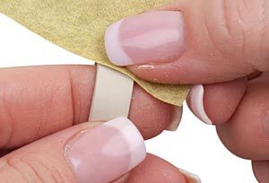 Clay ring being polished with polishing paper